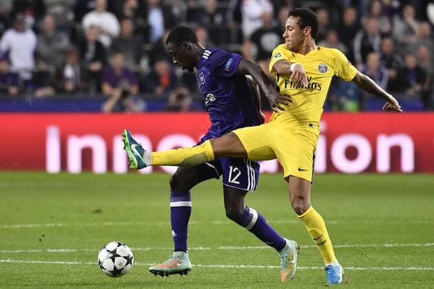 Anderlecht s Dennis Appiah and PSG s Neymar Jr pictured during a third game (out of 6) in the group stage (Group B) of the UEFA Champions League competition between Belgian soccer team RSC Anderlecht and French club PSG Paris Saint-Germain, Wednesday 18 October 2017 in Brussels. DIRKxWAEM  x05185410x