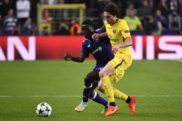 Anderlecht s Dennis Appiah and PSG s Adrien Rabiot pictured during a third game (out of 6) in the group stage (Group B) of the UEFA Champions League competition between Belgian soccer team RSC Anderlecht and French club PSG Paris Saint-Germain, Wednesday 18 October 2017 in Brussels. DIRKxWAEM  x05185404x