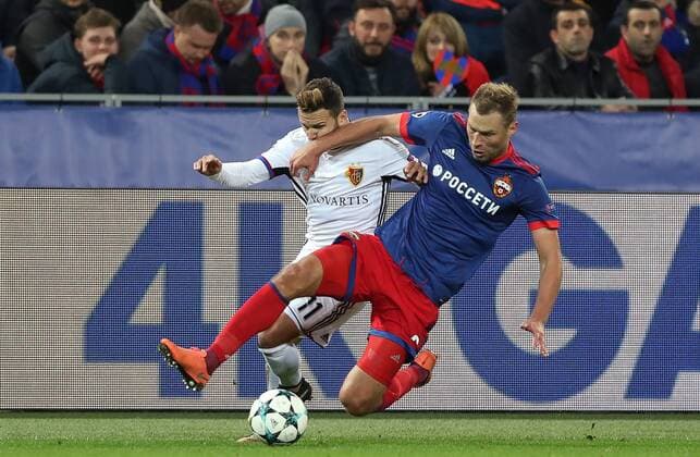MOSCOW, RUSSIA - OCTOBER 18, 2017: Basel s Renato Steffen (L) and CSKA Moscow s Alexei Berezutsky in their 2017 18 UEFA Champions League Group A Round 3 football match at VEB Arena. Artyom Korotayev TASS  TS065549