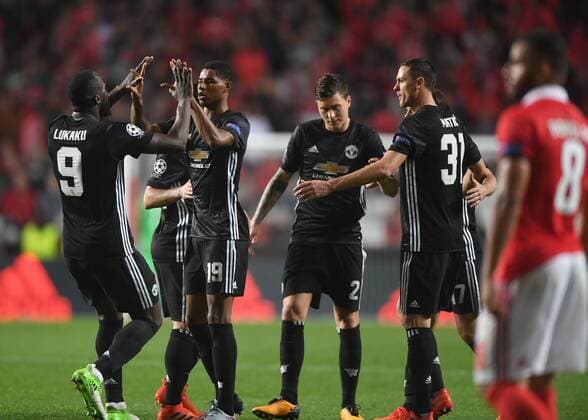 (171019) -- LISBON, Oct.19, 2017 -- Marcus Rashford (2nd L) of Manchester United ManU celebrates after scoring with his teammates during the third round match of Group A of 2017-18 UEFA Champions League between Benfica and Manchester United at the Luz stadium in Lisbon, Portugal on Oct. 18, 2017. Benfica lost 0-1.) (SP)PORTUGAL-LISBON-SOCCER-UEFA CHAMPIONS LEAGUE-BENFICA VS MANCHESTER UNITED ZhangxLiyun 