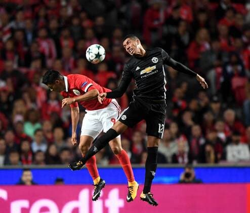 (171019) -- LISBON, Oct.19, 2017 -- Manchester United ManU s Chris Smalling (R) vies with Benfica s Raul Jimenez during the third round match of Group A of 2017-18 UEFA Champions League between Benfica and Manchester United at the Luz stadium in Lisbon, Portugal on Oct. 18, 2017. Benfica lost 0-1. ) (SP)PORTUGAL-LISBON-SOCCER-UEFA CHAMPIONS LEAGUE-BENFICA VS MANCHESTER UNITED ZhangxLiyun 