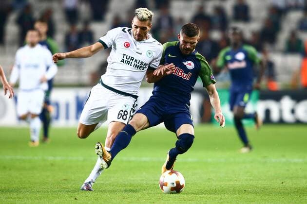 SOCCER - UEFA EL, Atiker vs RBS KONYA,TURKEY,19.OCT.17 - SOCCER - UEFA Europa League, Atiker Konyaspor vs Red Bull Salzburg. Image shows Mehdi Bourabia (Konyaspor) and Valon Berisha (RBS). GEPAxpictures xFelixxRoittner