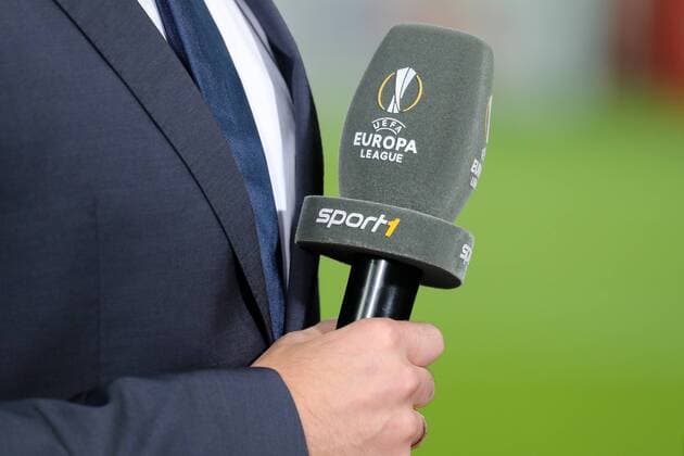a Microphone with the emblem the UEFA Europe League and with the Emblem of Sports channel Sport1 TV Television Symbolic image Symbol image symbol Football UEFA Europe League TSG 1899 Hoffenheim Istanbul Basaksehir xozx