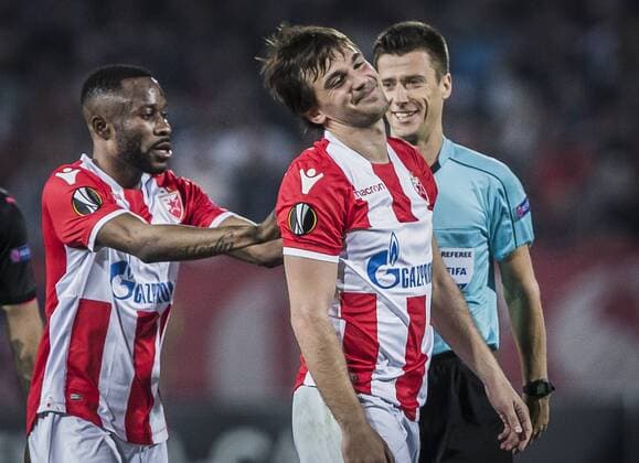 19th October 2017, Red Star Stadium, Belgrade, Serbia; UEFA Europa League Group Stage, Red Star Belgrade versus Arsenal; Midfielder Guelor Kanga of Red Star Belgrade and Defender Filip Stojkovic of Red Star Belgrade react during the match  ActionPlus11941475