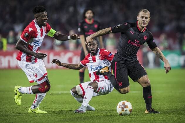 19th October 2017, Red Star Stadium, Belgrade, Serbia; UEFA Europa League Group Stage, Red Star Belgrade versus Arsenal; Midfielder Jack Wilshere of Arsenal in action against Midfielder Guelor Kanga of Red Star Belgrade and Midfielder Mitchell Donald of Red Star Belgrade  ActionPlus11941490