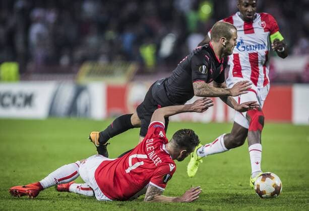 19th October 2017, Red Star Stadium, Belgrade, Serbia; UEFA Europa League Group Stage, Red Star Belgrade versus Arsenal; Midfielder Damien Le Tallec of Red Star Belgrade blocks Midfielder Jack Wilshere of Arsenal  ActionPlus11941479