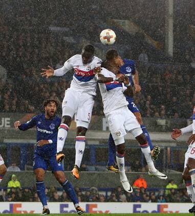 19th October 2017, Goodison Park, Liverpool, England; UEFA Europa League football, Everton versus Lyon; Dominic Calvert-Lewin of Everton leaps to win a header challenged by Marcelo and Bertrand Traore of Lyon  ActionPlus11941508