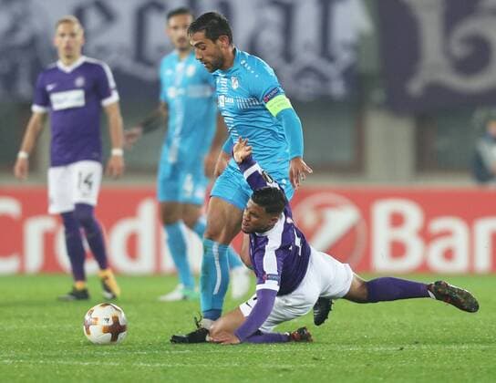 SOCCER - EL, A.Wien vs Rijeka VIENNA,AUSTRIA,19.OCT.17 - SOCCER - UEFA Europa League, FK Austria Wien vs HNK Rijeka. Image shows Mate Males (Rijeka) and Ismael Tajouri (A.Wien). GEPAxpictures xChristianxOrt