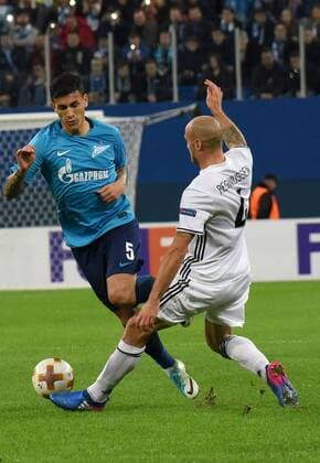Russia. St. Petersburg. October 19, 2017. Zenit players Leandro Paredes and Rosenborg Tore Regiinussen (left to right) during the UEFA Europa League group stage match between Zenit (Russia, St. Petersburg) and Rosenborg (Norway, Trondheim).