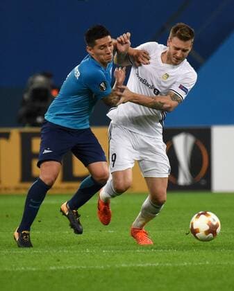 Russia. St. Petersburg. October 19, 2017. Zenit s Mathias Kranevitter and Rosenborg player Niklas Bendtner (left to right) during the UEFA Europa League group stage match between Zenit (Russia, St. Petersburg) and Rosenborg (Norway, Trondheim).