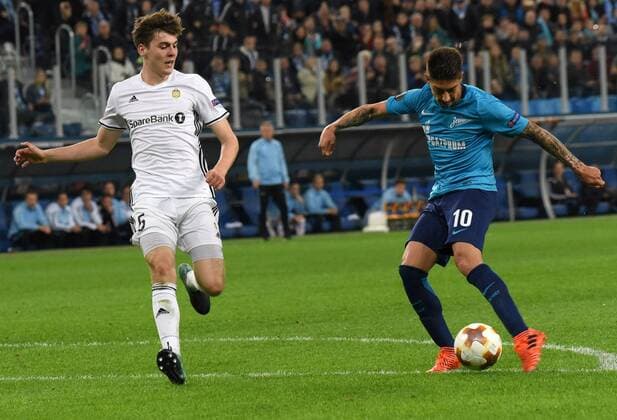 Russia. St. Petersburg. October 19, 2017. Rosenborg players Anders Trondsen and Zenit Emiliano Rigoni (left to right) during the UEFA Europa League group stage match between Zenit (Russia, St. Petersburg) and Rosenborg (Norway, Trondheim).