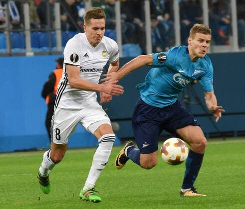 Russia. St. Petersburg. October 19, 2017. Rosenborg players Andres Conradsen and Zenit Alexander Kokorin during the UEFA Europa League group stage match between Zenit (Russia, St. Petersburg) and Rosenborg (Norway, Trondheim).