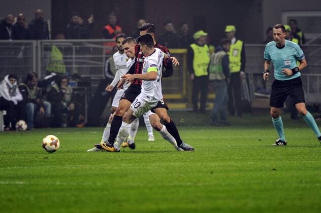 19th October 2017, San Siro, Milan, Italy; Andr& xe8; Silva of Milan competes for the ball with Petros Mantalos of Aek Athens during the UEFA Europa League football, AC Milan versus AEK Athens;  ActionPlus11941555