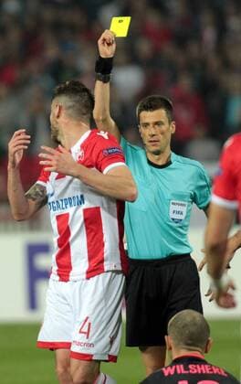 19.10.2017 Belgrade(Serbia) FK Crvena Zvezda(FC Red Star)-Arsenal Europa League men s football Benoit Bastien(r) France referee showed yellow card to Damien Le Tallec(L) FK Crvena Zvezda(FC Red Star) : 