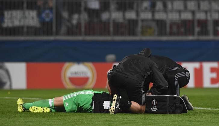 Injured goalkeeper Stephan Andersen of Copenhagen is cured during the 3rd round, group F, European League soccer match FC Fastav Zlin vs FC Copenhagen in Olomouc, Czech Republic, on October 19, 2017. (CTKxPhoto LudekxPerina) CTKPhotoP201710191094501  LPE 001