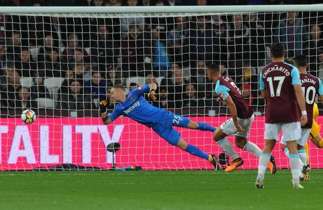 Football - 2017 2018 Premier League - West Ham United vs. Brighton & Hove Albion Glenn Murray of Brighton scores his first half goal past the diving Joe Hart at The London Stadium. COLORSPORT ANDREW COWIE 