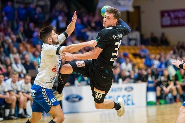 Adrian Kammlodt 30 of HC Elbflorenz 2016 with Ball and Jonas Hoenicke 20 of Dessau Rosslauer HV 06 Bauhausstadt Dessau Copyright: xEibner-Pressefoto HartmutxBoesenerx EP_BOE