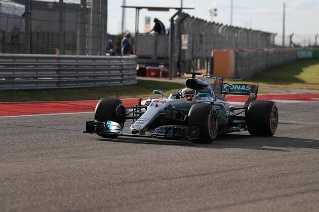 21st October 2017, Circuit of the Americas, Austin, USA; American Formula One Grand Prix, Saturday Qualifying; Lewis Hamilton - Mercedes AMG Petronas F1 Team takes pole and waves to the fans  ActionPlus11942728