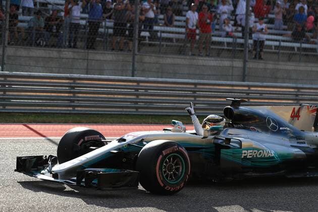 21st October 2017, Circuit of the Americas, Austin, USA; American Formula One Grand Prix, Saturday Qualifying; Lewis Hamilton - Mercedes AMG Petronas F1 Team takes pole and waves to the fans  ActionPlus11942729