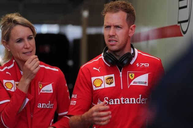 22.10.2017 - Britta Roeske (AUT) Ferrari Press Officer and Sebastian Vettel (GER) Scuderia Ferrari SF70H United States Grand Prix, Austin 19 - 22 October 2017 22.10.2017 - Britta Roeske (AUT) Ferrari Press Officer and Sebastian Vettel (GER) Scuderia Ferrari SF70H 