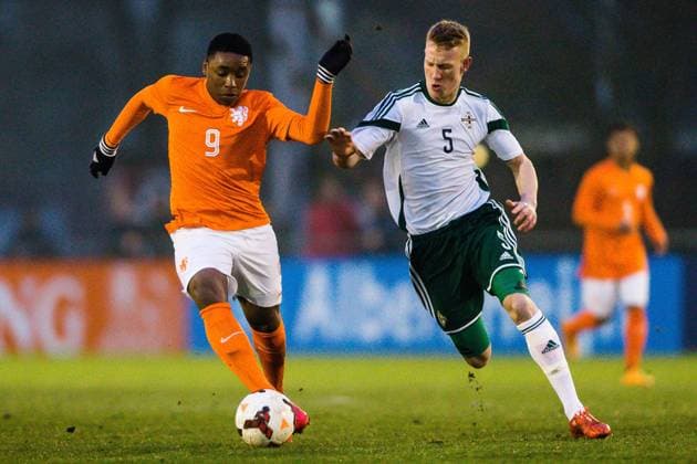 Alps to Pine tree Rhine The Netherlands below 18 North Ireland below 18 Football friendly sports park Zegersloot season 2014 2015 26 03 2015 Orange below 18 player Steven Bergwijn L North Ireland player Michael Newberry R The Netherlands North Ireland