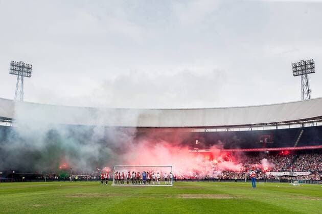 Rotterdam first training from Feyenoord Football season 2015 2016 Stadium the Kuip 28 06 2015 atmosphere image overview from the players on the field with the massive fireworks on the background first training Feyenoord
