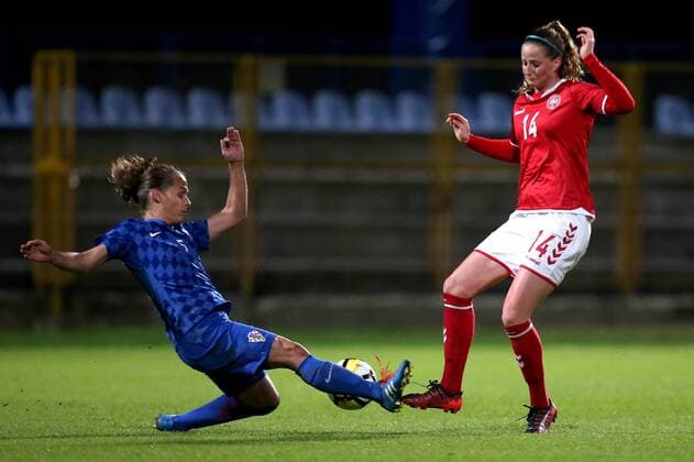 CRO vs DEN womens football - Zapresic, Croatia 24.10.2017., Zapresic, Croatia - Women s world cup qualification s UEFA match with Denmark, Group 4 at stadium in Zapresic. Denmark won 4:0. Kristina Nevrkla, Nicoline Sorensen.  IgorxKralj PIXSELL