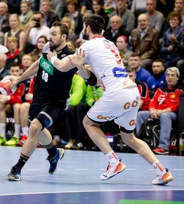 Tim Kneule No. 18 Germany is held by Eduardo Gurbindo No. 3 Spain Germany Spain Magdeburg Copyright: xDanielxReinelt xEibner-Pressefotx EP_drt