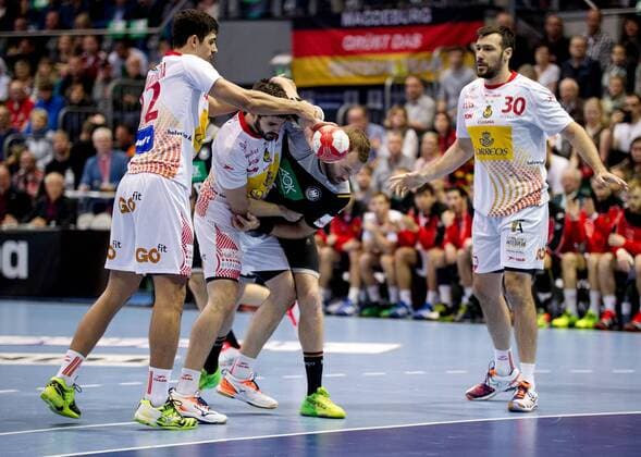 Steffen Faeth No. 23 Germany is held by Raul Entrerrios No. 9 Spain Germany Spain Magdeburg Copyright: xDanielxReinelt xEibner-Pressefotx EP_drt