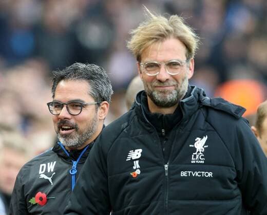 28th October 2017, Anfield, Liverpool, England; EPL Premier League football, Liverpool versus Huddersfield; urgen Klopp, Liverpool manager greets David Wagner, manager of Huddersfield Town before the match  ActionPlus11945193
