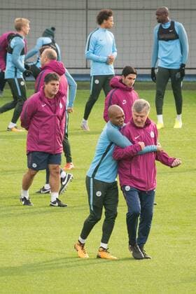 Manchester City Training Fernandinho of Manchester City hugs coach Brian Kidd during the Manchester City training session ahead of their Champions League match at City Football Academy, Manchester Content Not Available For UK Newspapers Copyright: xMattxWilkinsonx FIL-10884-0003