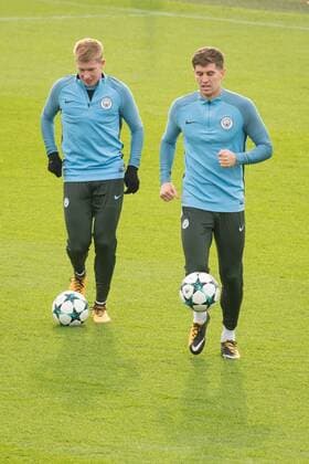 Manchester City Training Kevin De Bruyne (left) and John Stones of Manchester City during the Manchester City training session ahead of their Champions League match at City Football Academy, Manchester Content Not Available For UK Newspapers Copyright: xMattxWilkinsonx FIL-10884-0012
