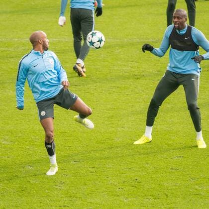 Manchester City Training Fabian Delph (left) and Yaya Tour? of Manchester City during the Manchester City training session ahead of their Champions League match at City Football Academy, Manchester Content Not Available For UK Newspapers Copyright: xMattxWilkinsonx FIL-10884-0017