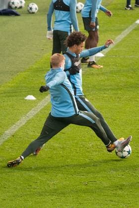 Manchester City Training Kevin De Bruyne of Manchester City tackles Leroy San? of Manchester City during the Manchester City training session ahead of their Champions League match at City Football Academy, Manchester Content Not Available For UK Newspapers Copyright: xMattxWilkinsonx FIL-10884-0019