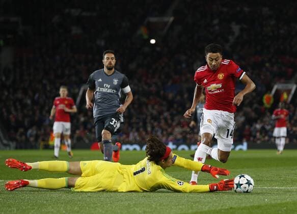 Jesse Lingard of Manchester United ManU attempts to round Mile Svilar of SL Benfica during the Champions League Group A match at the Old Trafford Stadium, Manchester. Picture date: October 31st 2017. Picture credit should read: Andrew Yates Sportimage EDITORIAL USE ONLY. No use with unauthorised audio, video, data, fixture lists, club league logos or live services. Online in-match use limited to 120 images, no video emulation. No use in betting, games or single club league player publications.