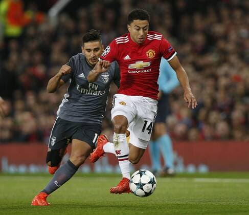 Jesse Lingard of Manchester United ManU gets past Eduardo Salvio of SL Benfica during the Champions League Group A match at the Old Trafford Stadium, Manchester. Picture date: October 31st 2017. Picture credit should read: Andrew Yates Sportimage EDITORIAL USE ONLY. No use with unauthorised audio, video, data, fixture lists, club league logos or live services. Online in-match use limited to 120 images, no video emulation. No use in betting, games or single club league player publications.