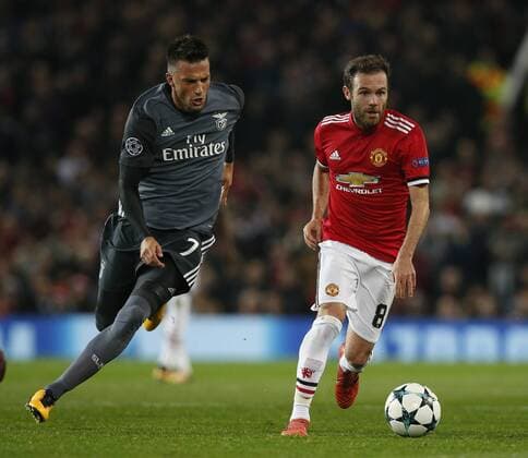 Andreas Samaris of SL Benfica shadows Juan Mata of Manchester United ManU during the Champions League Group A match at the Old Trafford Stadium, Manchester. Picture date: October 31st 2017. Picture credit should read: Andrew Yates Sportimage EDITORIAL USE ONLY. No use with unauthorised audio, video, data, fixture lists, club league logos or live services. Online in-match use limited to 120 images, no video emulation. No use in betting, games or single club league player publications.