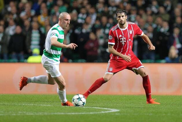 In action with Scott Brown 8 Celtic Glasgow and Javi Martinez 8 FC Bayern Muenchen Celtic Glasgow vs Bayern Munich Football Preliminary Round Champions League 31 10 2017 Glasgow Glasgow Scotland Copyright: xkolbert-press ChristianxKolbertx