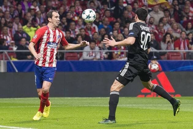 Atletico de Madrid Diego Godin and Qarabag Ramil Sheidaev during UEFA Champions League match between FK Qarabag and Atletico de Madrid at Wanda Metropolitano in Madrid, Spain. October 31, 2017.  (20171031014)