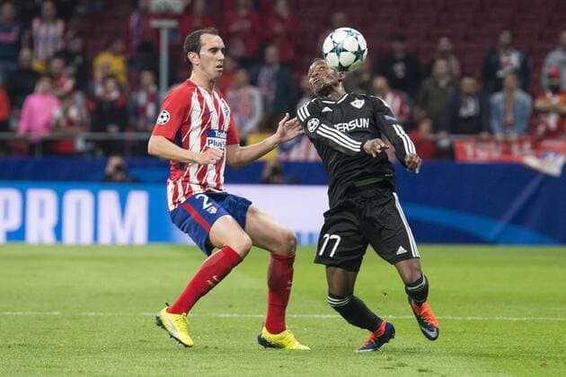 Atletico de Madrid Diego Godin and Qarabag Donald Guerrier during UEFA Champions League match between FK Qarabag and Atletico de Madrid at Wanda Metropolitano in Madrid, Spain. October 31, 2017.  (20171031018)
