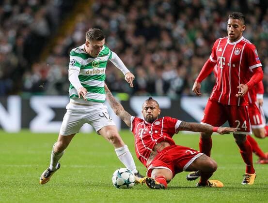 Glasgow Scotland 31 10 2017 UEFA Champions League 2017 18 Season Group Stage Group B 4 Gameday Celtic Glasgow FC Bayern Muenchen Callum McGregor CFC Arturo Erasmo Vidal FCB in action DeFodi048