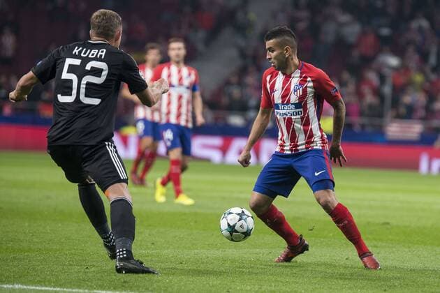 Atletico de Madrid Angel Martin Correa and Qarabag Jakub Rzezniczak during UEFA Champions League match between FK Qarabag and Atletico de Madrid at Wanda Metropolitano in Madrid, Spain. October 31, 2017.  (20171031015)