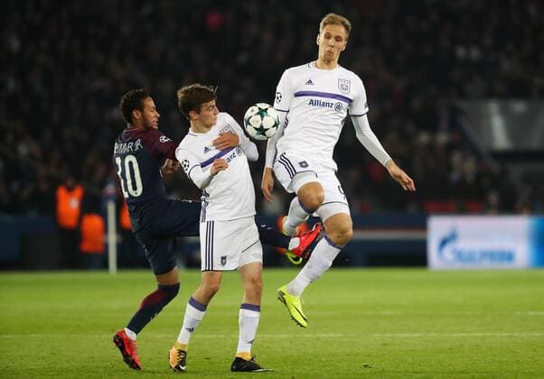 PSG s Neymar Jr, Anderlecht s Pieter Gerkens and Anderlecht s Lukasz Teodorczyk fight for the ball during a soccer game between French team Paris Saint-Germain Football Club and Belgian club RSC Anderlecht, Tuesday 31 October 2017 in Paris, France, the fourth match in the group stage (Group B) of the UEFA Champions League competition. VIRGINIExLEFOUR  x05193168x