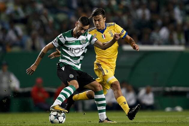 October 31, 2017 - Lisbon, Portugal - Sporting s midfielder Bruno Fernandes (L) vies for the ball with Juventus s forward Paulo Dybala (R) during Champions League 2017 18 match between Sporting CP vs Juventus FC, in Lisbon, on October 31, 2017. Sporting CP v Juventus - UEFA Champions League  - ZUMAn230 20171031_zaa_n230_329 Copyright: xCarlosxPalmax