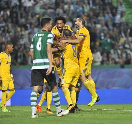 Sporting Lisbon v Juventus UEFA Champions League Gonzalo Higuain of Juventus celebrates scoring their first goal with team mates during the UEFA Champions League match at Est?dio Jos? Alvalade, Lisbon Content Not Available For UK Newspapers Copyright: xStefanoxGnechx FIL-10891-0022