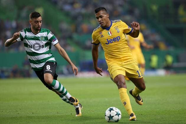 October 31, 2017 - Lisbon, Portugal - Juventus Brazilian defender Alex Sandro vies with Sporting s midfielder Bruno Fernandes from Portugal (L) during the UEFA Champions League football match Sporting CP vs Juventus at the Alvalade stadium in Lisbon, Portugal on October 31, 2017. Sporting CP v Juventus - UEFA Champions League  - ZUMAn230 20171031_zaa_n230_363 Copyright: xPedroxFiuzax