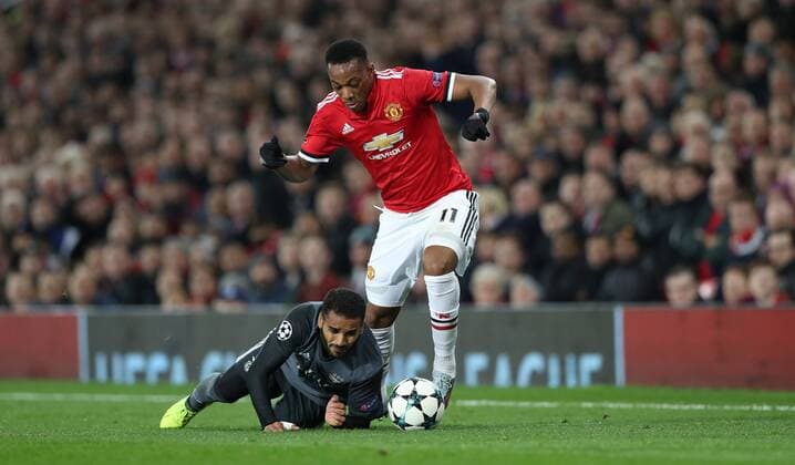 Football - 2017 2018 UEFA Champions League - Group A: Manchester United ManU vs. S.L. Benfica Anthony Martial of Manchester United and Douglas of SL Benfica at Old Trafford COLORSPORT LYNNE CAMERON 