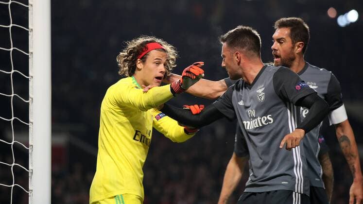 Football - 2017 2018 UEFA Champions League - Group A: Manchester United ManU vs. S.L. Benfica Mile Svilar of Benfica is congratulated after saving Anthony Martial of Manchester United penalty at Old Trafford COLORSPORT LYNNE CAMERON 