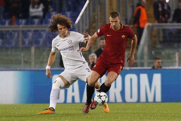 Italy: Roma beats Chelsea during the Champions League Roma s Edin Dzeko, right, is challenged by Chelsea s David Luiz during the Champions League Group C soccer match between Roma and Chelsea at the Olympic stadium Rome Italy  RiccardoxDexLucax xPacificxPress