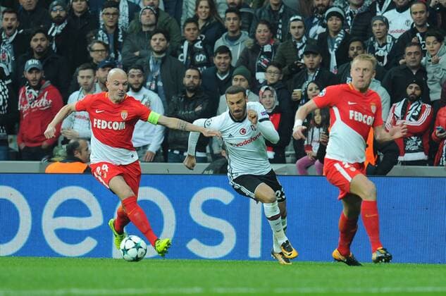 Cenk Tosun of Besiktas and Andrea Raggi 24 , Kamil Glik 25 of Monaco during the UEFA Champions league Group G match between Besiktas and Monaco at Vodafone Arena in Istanbul on November 01 , 2017. 